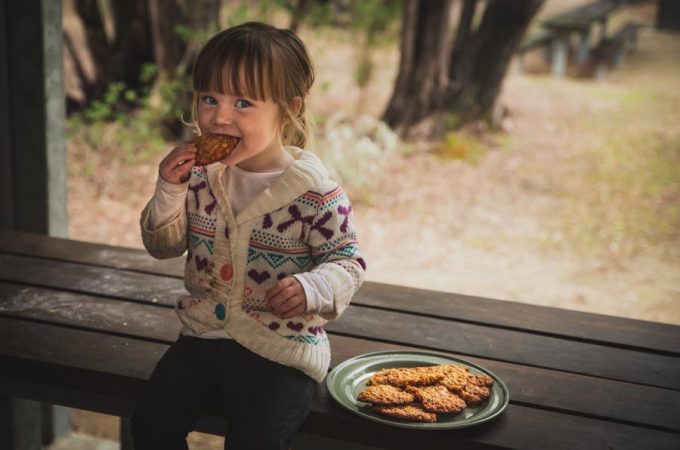 Sweet, chewy Anzac Cookies cooked on a barbeque or campfire - the perfect campsite snack to please the whole family. A quick and easy traditional snack #camping #campfirecooking #campdinner #easy dinner #barbequerecipe #recipe #camprecipe #cookie #anzaccookie